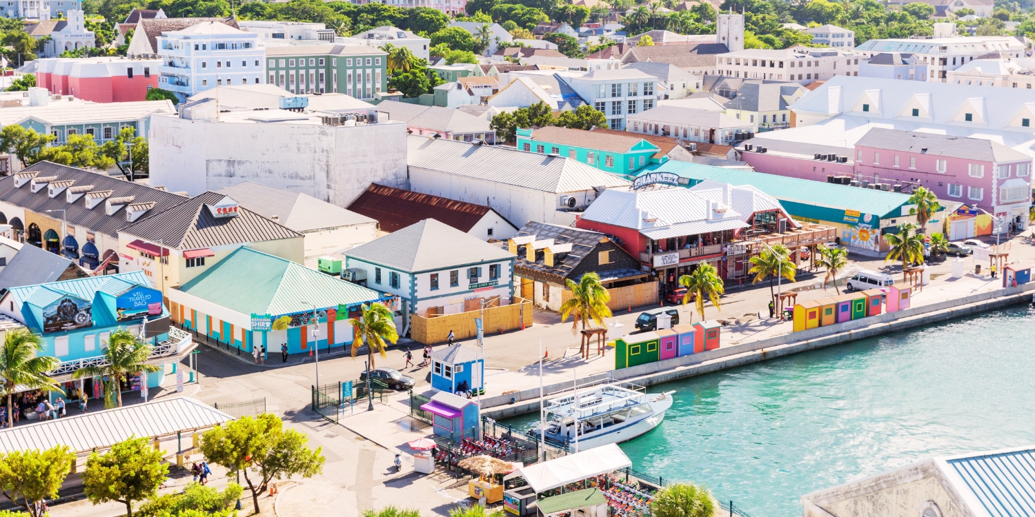 Friends using a Nassau local taxi service for a dinner transfer to Arawak Cay.
